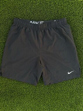 Nike Men's Black Athletic Shorts with White Swoosh